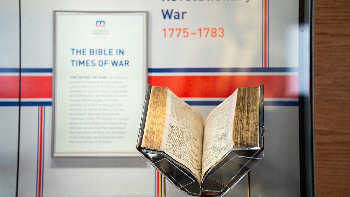 foxnewspolitics's tweet photo. American troops carried pocket-sized Bibles encased in thin metal over their hearts during World War II, fueling stories that the books could stop a bullet. The Museum of the Bible's new "Bible in Times of War" exhibit reveals the truth is less cinematic — the metal covers were unlikely to stop high-speed ammunition — but the real power of the so-called Heart Shield Bibles was never about ballistics.

Inside the covers, handwritten notes from mothers and wives survive decades later. "To my dear boy, may God keep you safe," one reads. Another simply says, "praying for you at Christmas." In many cases, historians don't know who wrote the messages or who received them. The anonymity makes them more powerful, not less.

The exhibit traces how Scripture traveled with American service members from the Civil War through Korea and even to Antarctica — not as armor, but as something soldiers carried when they had nothing else to hold onto.