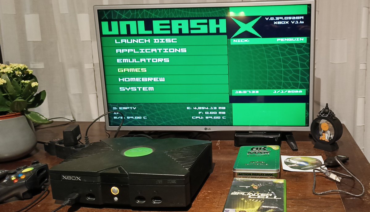 HiddenNinja25K's tweet photo. These are 2 old photos from somewhere in 2024 where I had softmodded 2 of my #OriginalXbox consoles (I used up-to-date #Xbox Consoles, a PC, Rocky5's #softmodding Tool & the stuff on my table in the photos, to Softmod it) https://t.co/CHwb04SjLU