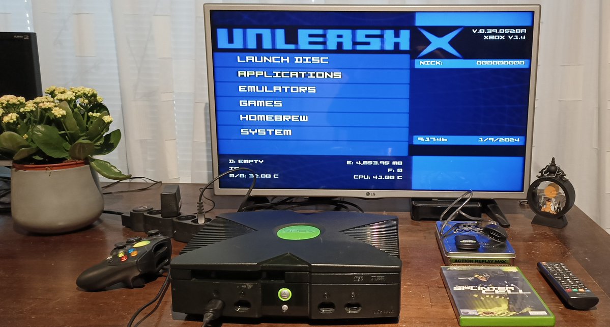 HiddenNinja25K's tweet photo. These are 2 old photos from somewhere in 2024 where I had softmodded 2 of my #OriginalXbox consoles (I used up-to-date #Xbox Consoles, a PC, Rocky5's #softmodding Tool & the stuff on my table in the photos, to Softmod it) https://t.co/CHwb04SjLU