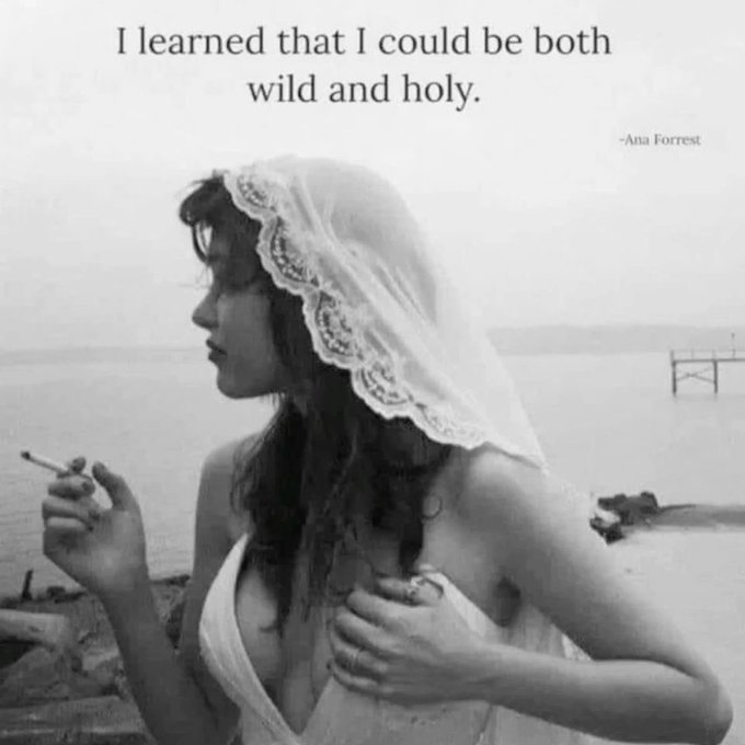 A black-and-white photo of a woman in a lace veil holding a cigarette by a lake, with the quote: 'I learned that I could be both wild and holy.' —Ana Forrest