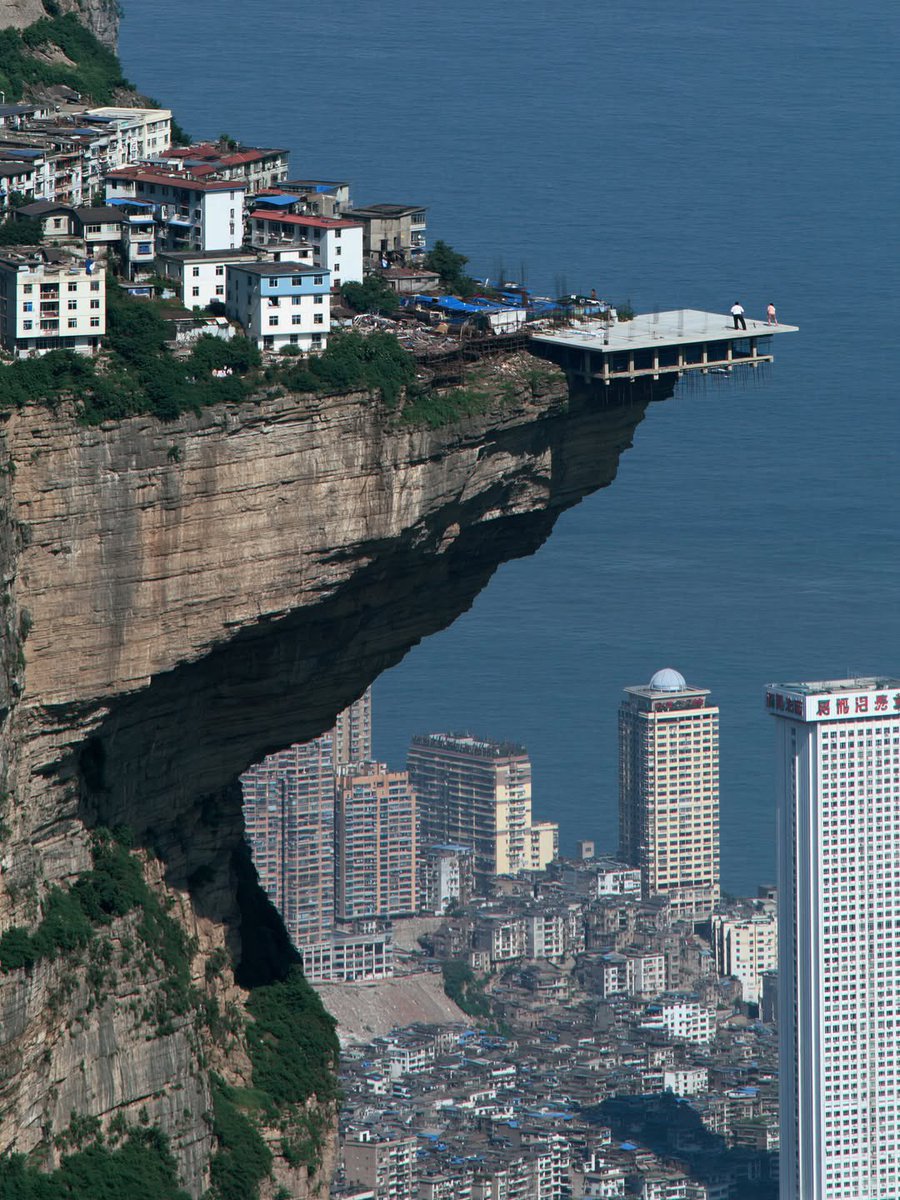 parametricarch's tweet photo. 🌍 Plot twist: the city was never the big thing.

In Maxime Velhinho De Araujo’s imagined worlds, entire skylines become background noise. Cliffs slice through neighborhoods, oceans rise beside impossible edges, and geological forms arrive at a scale that makes skyscrapers look almost incidental.