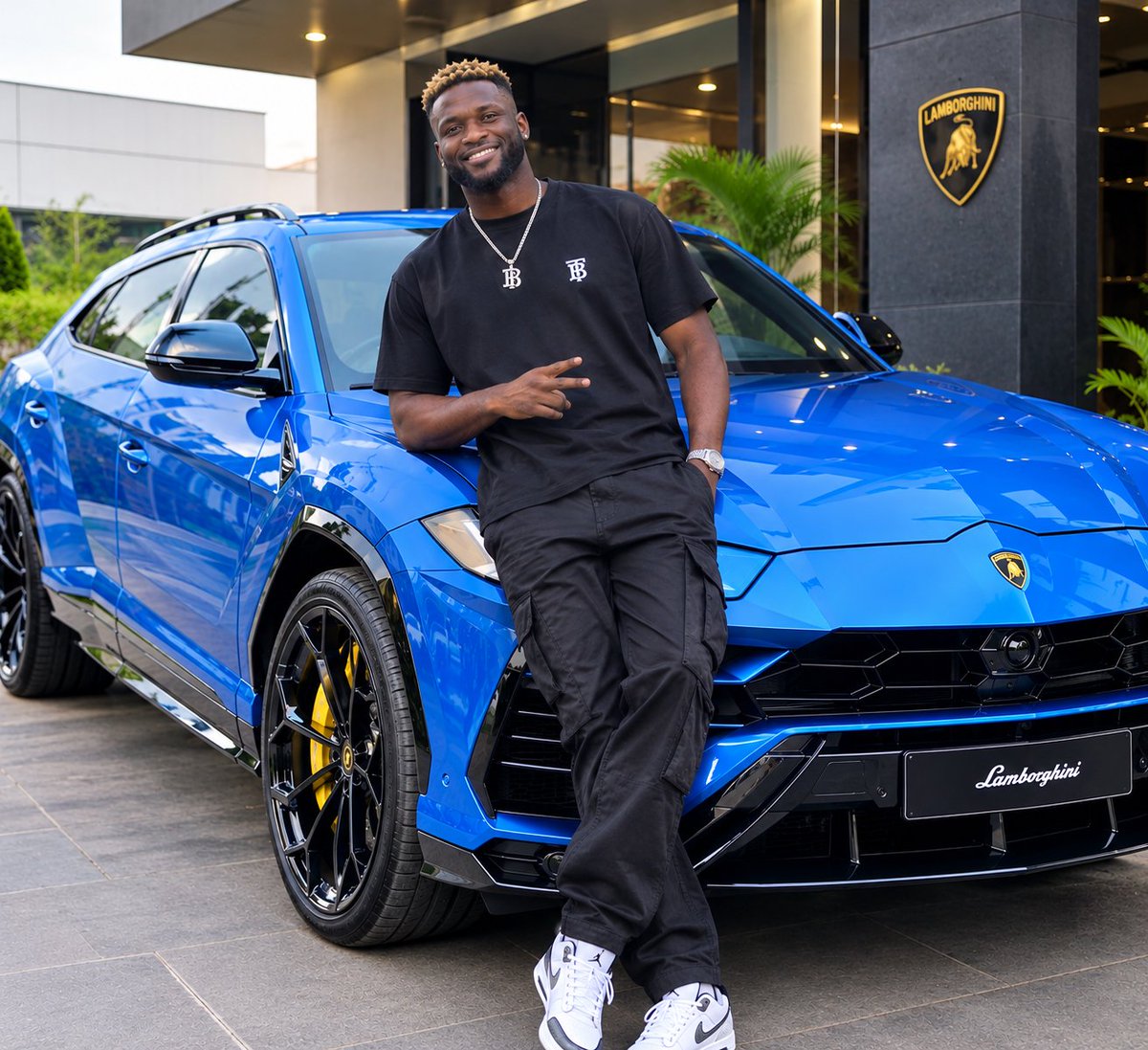 CashCopingHQ's tweet photo. Nigeria footballer "Victor Boniface just bought a brand new Lamborghini Revuelto - V12 Hybrid Supercar, for he's junior brother. 

Bro is massive 💰💰💰 https://t.co/a6Zu8W4IzX