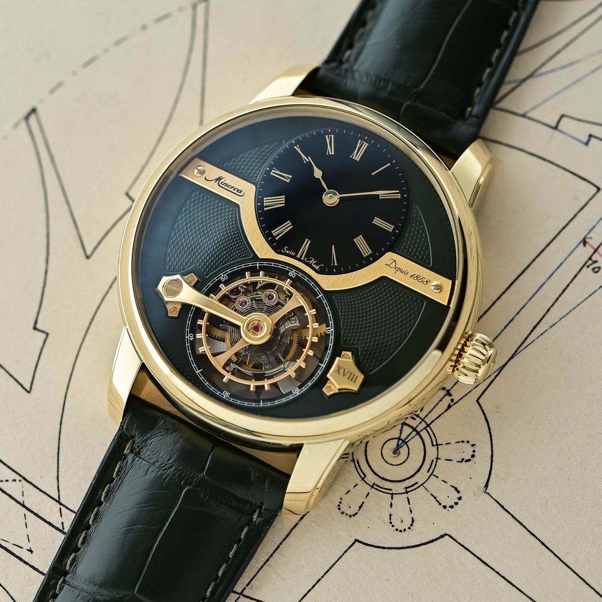 BEYODTHEDIAL's tweet photo. Minerva putting the balance *above* the tourbillon cage is either brilliant or slightly unhinged. Possibly both.

“Exo” = outside: the oscillator sits on top of the rotating cage instead of hiding in it. Olive guilloché, black onyx hours, yellow gold — 18 pieces. Also: 44.8 × 15.03 mm and 30 m. Architecture you can see, thickness you will feel.

(Press / first-look images via Monochrome — not ours.)