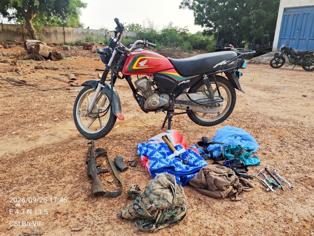 DaChE46's tweet photo. Troops raid terrorists’ enclave, neutralise fighter, recover AK-47 in Sokoto

By: Zagazola Makama

Troops of Sector 2, Operation FANSAN YAMMA, have neutralised a terrorist during a raid on a suspected terrorist hideout in Gudu Local Government Area of Sokoto State.

Security sources told Zagazola Makama that the operation was conducted following credible intelligence on the presence of terrorists around Karani village.

The troops advanced towards the suspected terrorist camp and, upon making contact with the hostile elements, engaged them with firepower, neutralising one terrorist while others fled into the surrounding forest.

During the exploitation of the camp, the troops recovered one AK-47 rifle loaded with live ammunition, one operational motorcycle, military camouflage uniforms, maintenance tools and other logistical supplies.

Following the encounter, the troops conducted clearance operations across the surrounding forest axis to dominate the area and deny the fleeing terrorists freedom of movement.

The recovered weapons and equipment have been taken into custody as troops continue operations to track fleeing members of the group and dismantle their networks in the area.