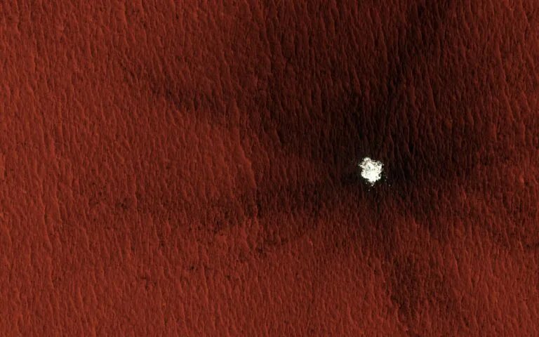 ArctyraGroup's tweet photo. ✅ This is how NASA found water ice on MARS! 

                                •   •   • 

NASA found water ice on Mars in stages: first from orbit (indirect hydrogen and thermal signatures), then by seeing ice exposed in fresh craters, and finally by digging it up and analyzing it on the surface.

1. First large-scale detection: 2001 Mars Odyssey orbiter (2002)
The 2001 Mars Odyssey spacecraft used its Gamma Ray Spectrometer (GRS) suite — a gamma-ray sensor plus neutron detectors — to map hydrogen in the top ~1 meter of soil. Hydrogen is a strong indicator of water ice.

Results showed abundant ice from about 55° latitude to both poles — enough, scientists said, to fill Lake Michigan twice. Near the poles the soil can be more than 50% ice by volume (“dirty ice”). Equatorial regions showed far less.

Odyssey’s THEMIS thermal camera later helped map how shallow that ice is by measuring how the ground heats and cools.

2. Ice seen from space in fresh craters: Mars Reconnaissance Orbiter (MRO)
MRO (arrived 2006) used its high-resolution HiRISE camera to photograph new meteorite impact craters. Several of those craters punched through the dusty surface and exposed bright ice only 0.5–2.5 m down — even at mid-latitudes, farther from the poles than expected. Spectrometers on MRO confirmed the bright material was water ice.

MRO’s SHARAD radar also mapped thicker buried ice sheets, including a large deposit in Utopia Planitia.

3. First direct “touch and taste”: Phoenix lander (2008)
• NASA sent the Phoenix lander to 68°N (farther north than any previous lander) specifically to check Odyssey’s predictions.
• Landing thrusters blew away a thin layer of soil and exposed bright ice under the spacecraft.
• The robotic arm dug trenches (notably “Dodo-Goldilocks”). White chunks appeared.
• Over four Martian days those chunks vanished — they sublimated (went from ice straight to vapor). Salt or dry ice (CO₂) would not have behaved that way.

A sample was delivered to the Thermal and Evolved-Gas Analyzer (TEGA). When heated, its mass spectrometer detected water vapor at 0 °C. NASA announced the confirmation on 31 July 2008.

📝 Ice was only a few centimeters beneath the surface at that site.

📍Other relevant hardware: 
• Polar ice caps themselves had been photographed since the Mariner and Viking eras, but they are mixed with seasonal CO₂ ice.
• Later rovers (Curiosity’s DAN neutron detector, Perseverance’s RIMFAX radar) have measured water bound in minerals or looked for ice in the shallow subsurface, but Phoenix remains the mission that first physically sampled water ice.

🛰️ In short: Odyssey found the ice from orbit by detecting hydrogen; MRO photographed it in new craters; Phoenix dug it up, watched it disappear, and chemically confirmed it was H₂O.