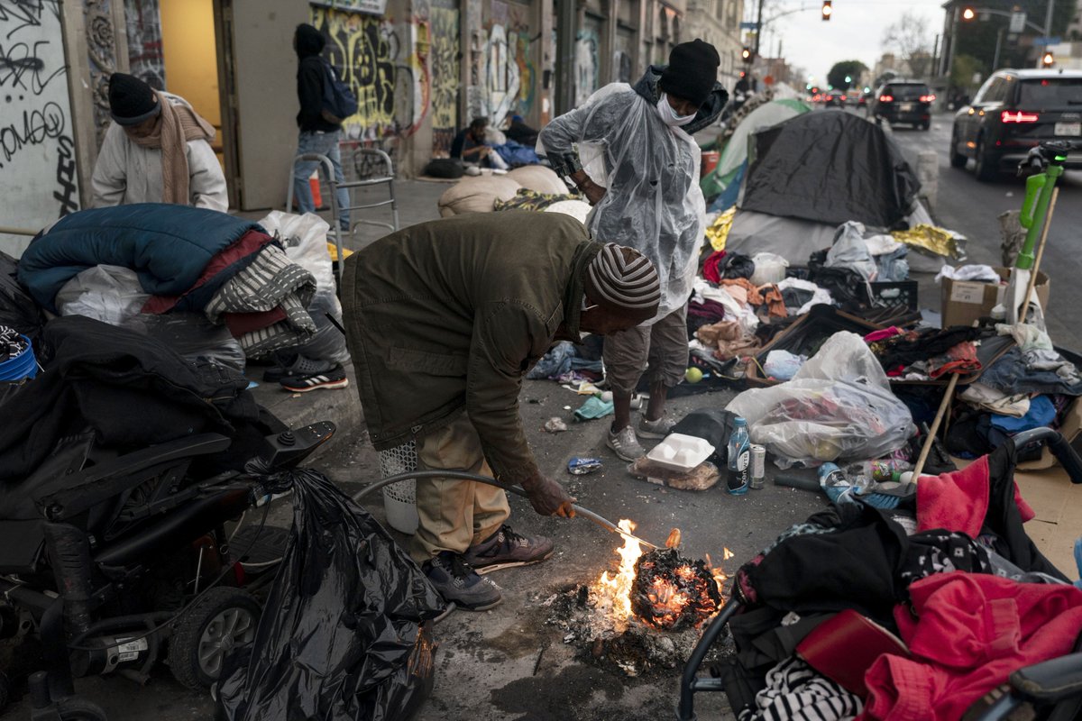 JustmeBhacket's tweet photo. @GavinNewsom So skid row is what, roughly 54 city blocks. And about 10k to 15k "unhoused" people occupying that space. Why is that? Why is skid row left alone year after year? Why is this happening downtown in the city of Los Angeles? 10-15k people. Shame on you Governor. https://t.co/EqPSw2rhiv