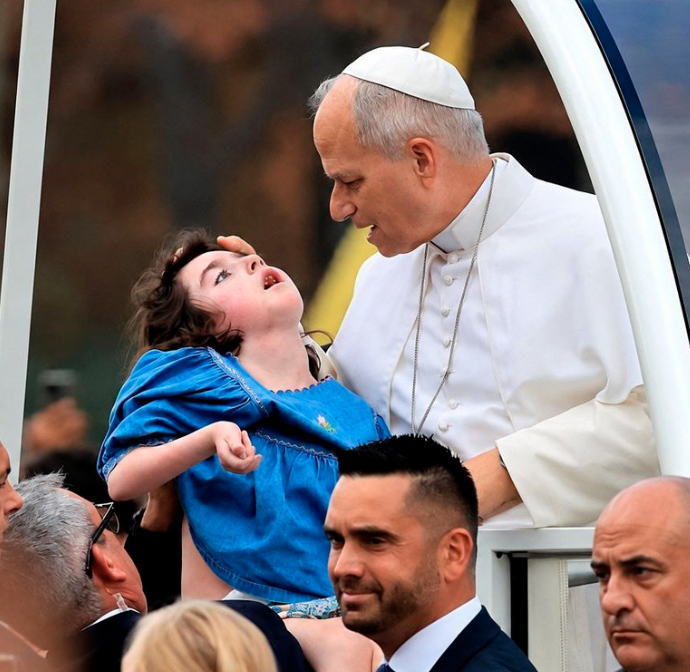 SohrabAhmari's tweet photo. Embracing children with Down syndrome and other people with disabilities, the ailing and elderly whose lives are deemed unworthy to live by assisted-suicide advocates---Pope Leo XIV is a counter-witness to our age. (As beloved Francis was, too!)

It's all so distant from the Crusader LARPing, crypto-Nietzschean flexing, and angry chauvinism that define the faith for a subset of mainly young men online. It is to be hoped that at least some of them can glimpse the real thing in Leo's public ministry.