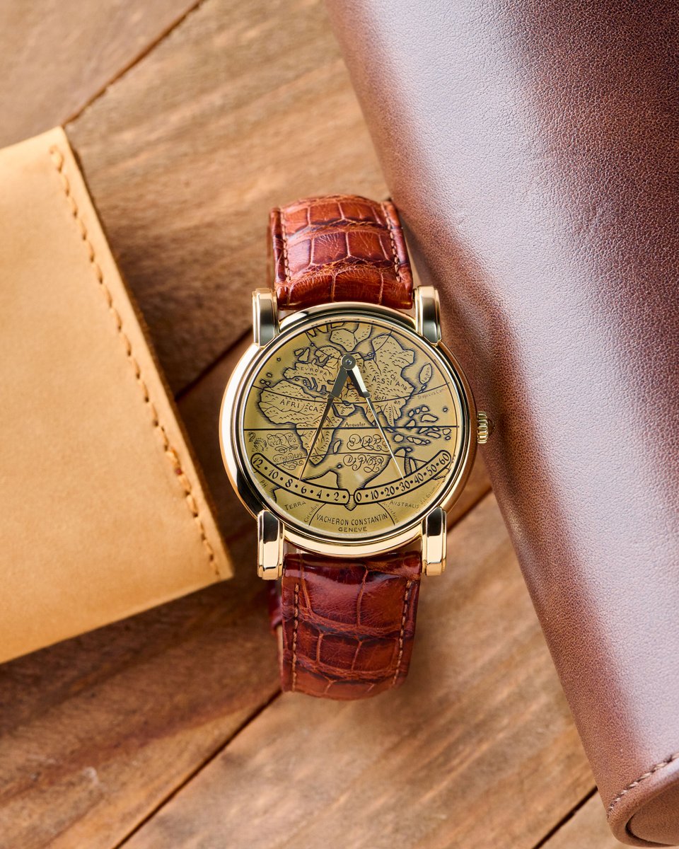EuropeanWatchCo's tweet photo. The hands on this watch aren't just hands, they're the arms of a map divider, opening and closing.

Vacheron Constantin didn't come up with this model on their own. It was conceived and designed by the Belgian independent watchmakers and master enamelers Jean and Lucie Genbrugge.

The hands pivot from a single point near twelve rather than from the centre of the dial, and they sweep two separate arcs across the bottom half. Hours on the left, one to twelve. Minutes on the right, zero to sixty. Both are retrograde. The hour jumps, the minute drags its way along the arc and then snaps back to zero at the top of the hour, which is the moment the two legs close on each other like a compass lifting off a chart.

Underneath them is a solid 22 carat gold plate, with the continents engraved into it and filled with black enamel. Not printed. Cut. The source is a map Gerardus Mercator drew in 1587, and the engraving keeps his Latin, so you can read EVROPA, AFRICA, ASIA and TERRA AVSTRALIS on the dial, along with Aequator and Tropicus Cancri running across it.

The man behind all of it was Jean Genbrugge, who was a watchmaker and an enameller. He developed the bi-retrograde module in the early 1990s and took it to Vacheron, who reworked it for production. He and his wife Lucie then made the dials themselves at their atelier in Broechem, Belgium. Roughly twelve days of work went into each one.

The date is not an accident either. Mercator died in December 1594, and the watch arrived in 1994 for the four hundredth anniversary. Turn it over and that is engraved on the rotor, "1594 Gerard Mercator 1994", visible through the sapphire caseback. The case is a revival too with a stepped bezel and overhanging fluted lugs taken from Vacheron's Geographique of the late 1940s. Thirty six millimetres, 8.4mm thick, on the calibre 1120 with the retrograde module on top. Vacheron planned to build fifty. They stopped at 638, ten years later.

Available now.