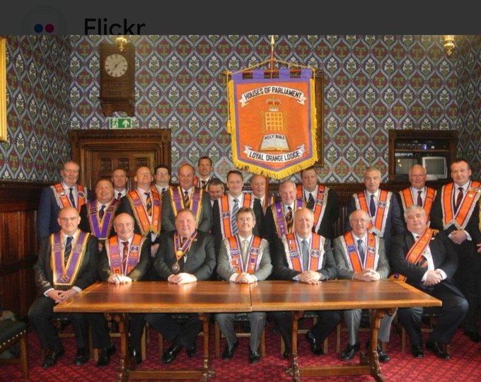 BjCruickshank's tweet photo. The Orange Order is often rightly rereferred to as the Brit version of the Ku Klux Klan. One hates Catholics the other black/brown skinned people. I wonder how many people in the UK know that there is an Orange Order Lodge in the British Houses of Parliament? Absolutely shocking! https://t.co/IWCiXuHElh