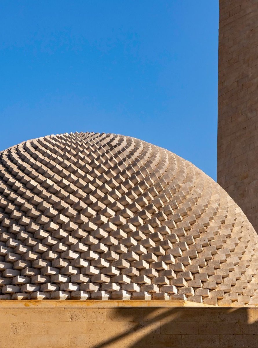 hutdesigns's tweet photo. The architects did a wonderful job making the Basuna Mosque feel modern while still matching the sandy desert tones nearby https://t.co/TPZBQXw18s