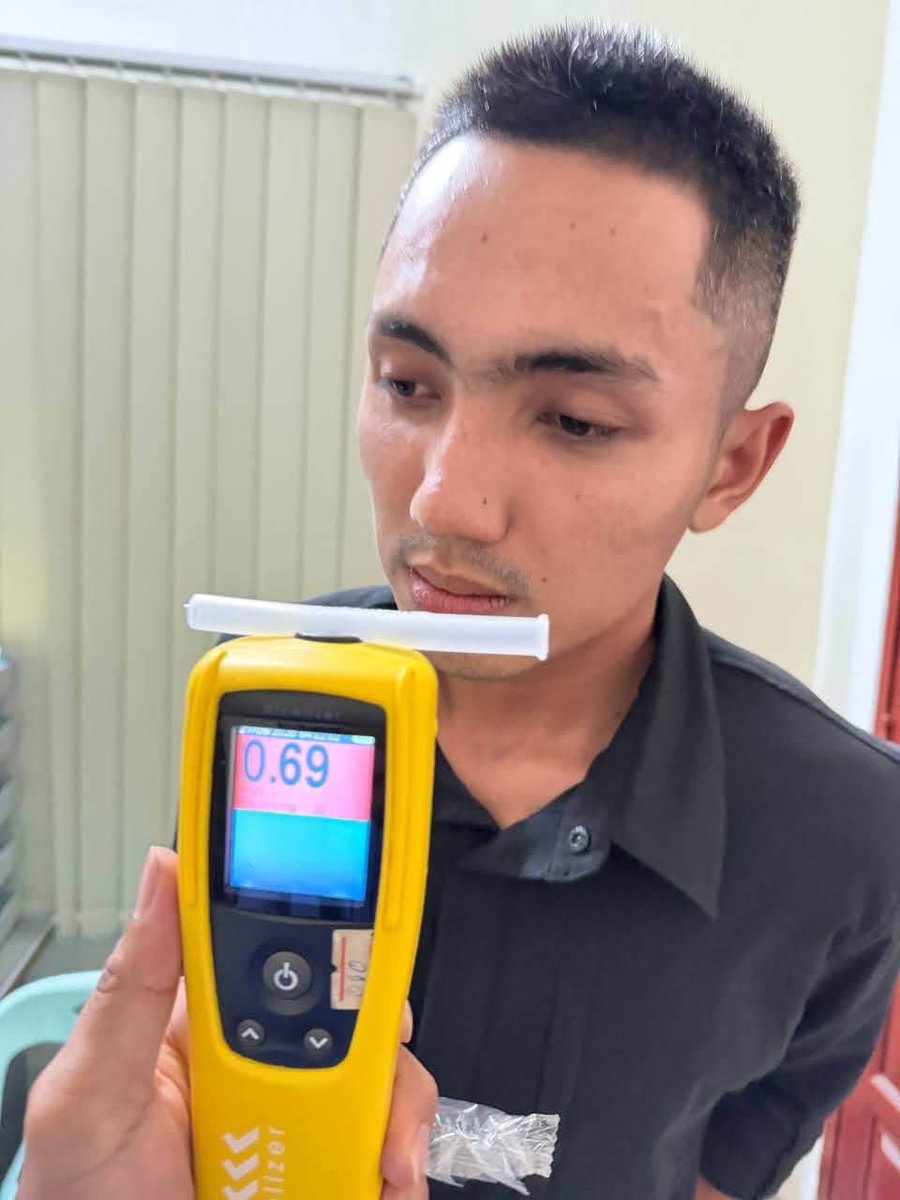 jacobincambodia's tweet photo. Police photos add some pretty important context to this morning’s fatal Phnom Penh crash.

The Jeep driver appears to have tested positive for methamphetamine, while his breathalyzer registered 0.69 mg/L. That alcohol reading is roughly equivalent to a 0.14–0.15% BAC, nearly twice the legal driving limit in most of the U.S.

He allegedly hit and killed a bank security guard, then tried to flee before bystanders caught him.
