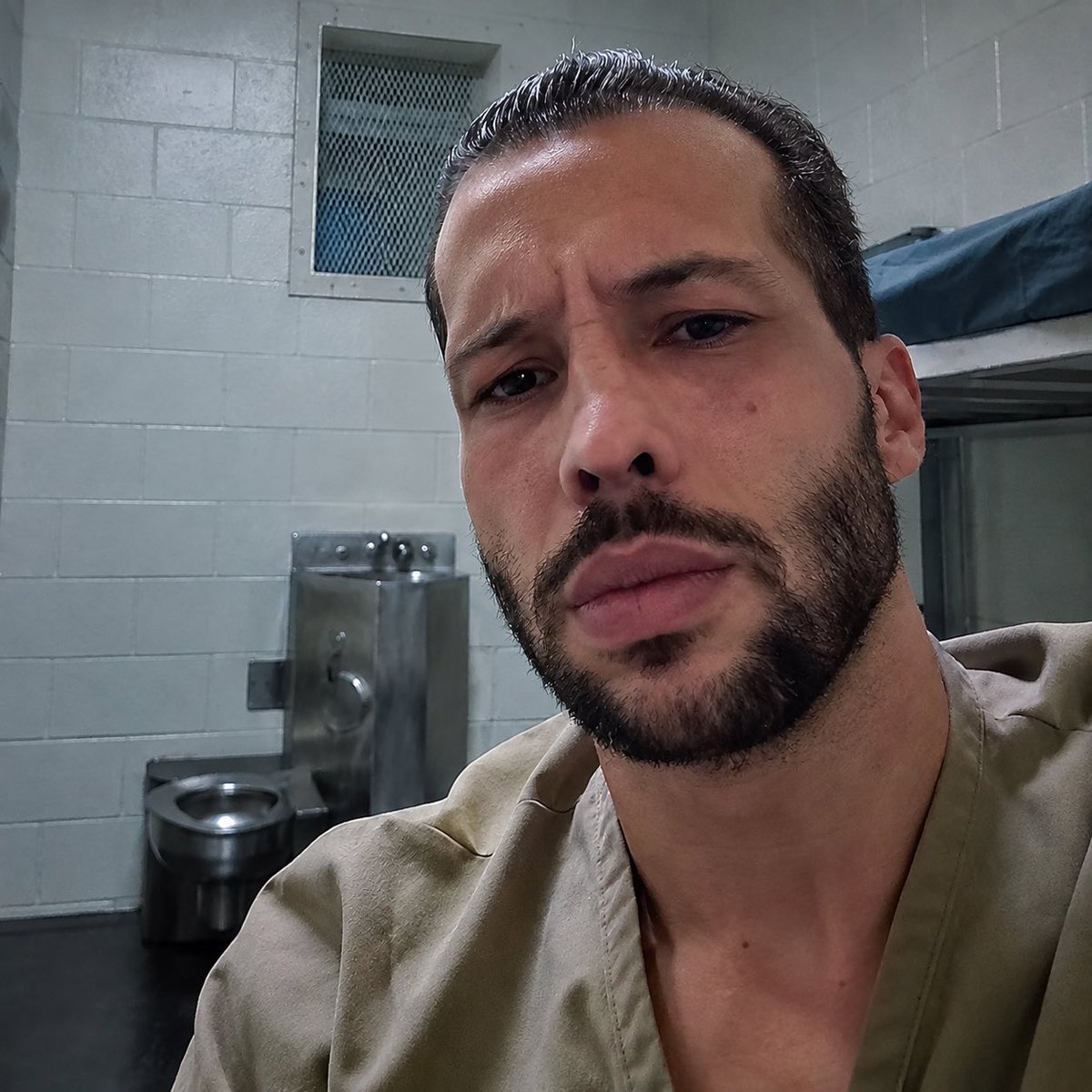 tatedailytake's tweet photo. 🚨 Tristan Tate has now sat 70 days in a cage and the file they promised after 60 still is not in his hands.

The UK filed a request with the State Department. That is not the same as putting the warrants, charging papers, and proof in front of him.

What is public is the July arrest summary. Accuser names stay hidden. The full file is still inside review.

The process can hold him for months after that filing, then a year or more if they fight it. The evidence clock was never the liberty clock.

What evidence was submitted. What has actually been disclosed. How long this can continue.

He is still in the cell.