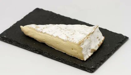 ArmandDAngour's tweet photo. “My late brother Francis, staying with a French family to improve his knowledge of the language, was helping himself to cheese at dinner. The plateau included a wedge of brie, and the inexperienced Englishman, instead of slicing along the side, cut off the point, or nose. His hostess, exercising that special French skill in making foreign visitors feel at ease, remarked: ‘Je n’ai jamais vu personne qui découpât comme ça le nez d’un brie.’ Francis said that he distinctly heard, in the air above the family dining-table, the sharp hiss of the circumflex over the third person singular of the past subjunctive.” 
 — John Sturrock, London Review of Books 1996