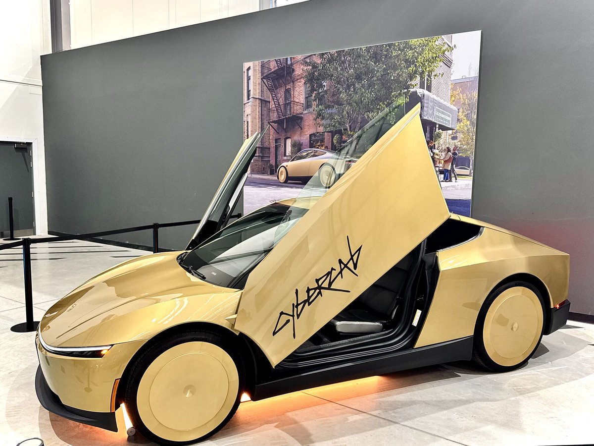 SERobinsonJr's tweet photo. TESLA: Cybercab on public display at the Tesla England Manchester Trafford Delivery Centre, M17 1SN. It will be there until Wednesday, September 30th. 

Pics by Rebeka Rotyis, Tesla Customer Experience Specialist.