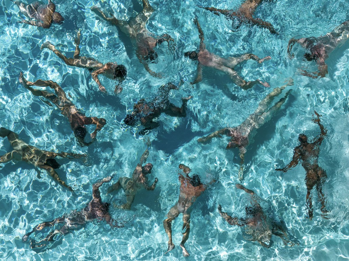 RobinLayton's tweet photo. #swimmers shot with drone in #palmsprings one of my many faves in my newest book #bare https://t.co/SL5TA1YO2e