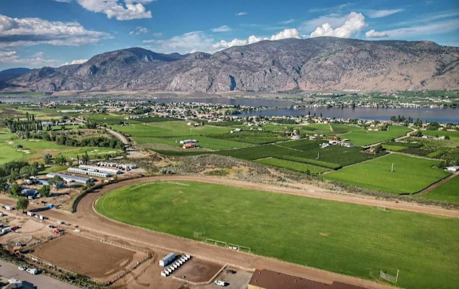 AmWager's tweet photo. An exciting time in British Colombia, Canada, as they host Desert Park @desetparkrcway, a new harness track debuting opening day TODAY! Set in the heart of the spectacular Okanagan Valley, Desert Park Raceway overlooks Osoyoos Lake, rolling vineyards, with a 5/8 mile track & 810-ft homestretch—one of North America's LONGEST! AmwWager brings it for you to play! Get in on the action NOW, first post is 5:00pm ET  #DesertParkRaceway #BritishColombia #HarnessRacing #AmwWager🍁🐎💵