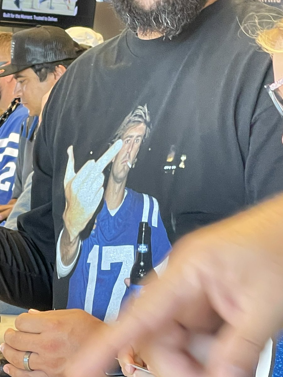 waynealan_indy's tweet photo. At the @Colts game, this guys has the best shirt!!!! Colts QB @Daniel_Jones10 🖕🏼🍻 Cheers!! LUV IT!! https://t.co/tvAQa7VEy7