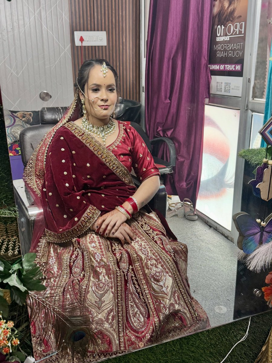JongStam0k's tweet photo. Confident, graceful, and regal. The modern bride in her royal era, wrapped in red and glowing like a dream. Makeup: @makeupby__ruchi_ 
Outfit: @mishika. _creations https://t.co/JolUKqQWHP