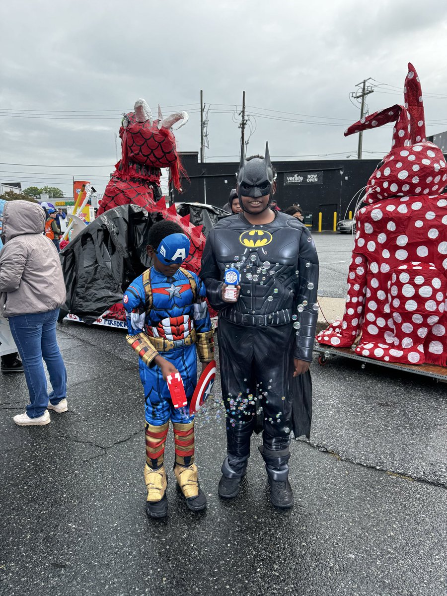 VoteforEsther's tweet photo. Wheaton Arts Parade, thank you for the warm welcome. The rain couldn’t hold us back. Vote for Esther Wells for County Executive. #WinWithWells. https://t.co/XFsC13r1mG