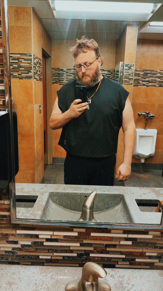 RonBassJr's tweet photo. Oh hey my 7 year wrestling anniversary is today

I’ll have a sappier post about it later but I wrestled yesterday and immediately got on the road to wrestle in New Jersey today

I’m a gun, I love this shit, I’m meant for this

Have a handsome truck stop selfie to hold you over https://t.co/iq8QpCWDIl
