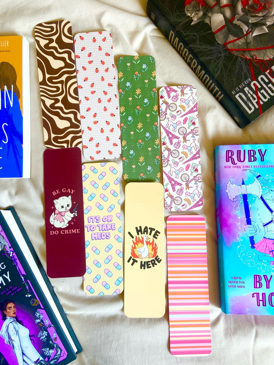 JanisAndreluy9's tweet photo. My newest bookmarks from @gigiandbo! I love her designs and how large they are. My favorites are “it’s okay to take meds” and the brown-and-cream swirl. Her shop has a bookmark for every book. Side note: this is my favorite song from Ariana’s new https://t.co/VVPNn7S7g0