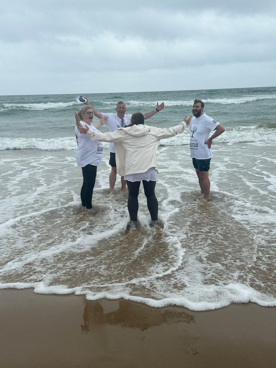 HuntyCaller's tweet photo. Love this photo! Amy with her back to us in the sea with full kit, including trainers…sister Alison on the left and Gareth on the right. An amazing team. What a week!! https://t.co/vK312Po4eq
