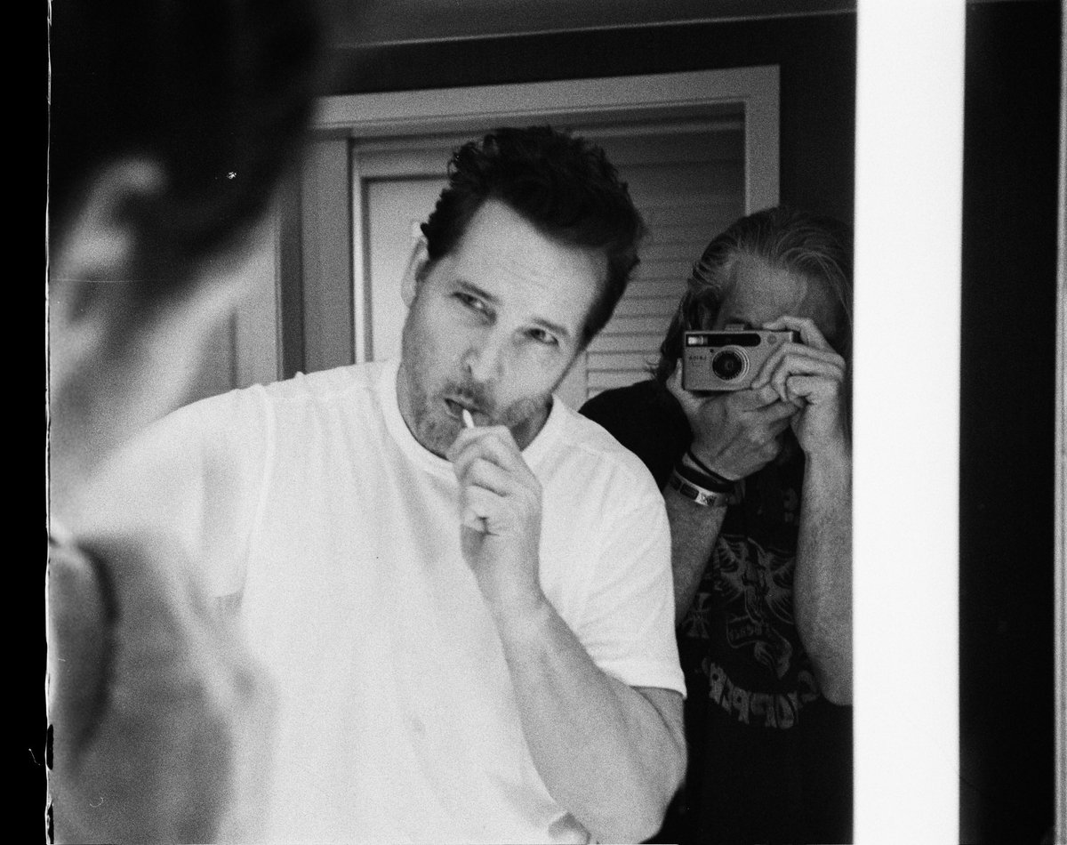 JoshuaShultz's tweet photo. For today’s Fine Art photos I present to you @peterfacinelli brushing his teeth 🦷 shot on Black and White film 🎞️ on @leica_camera #Minilux  on @kodak in Tampa #kodak #leica #twilight https://t.co/eHJ1j8ZqHf