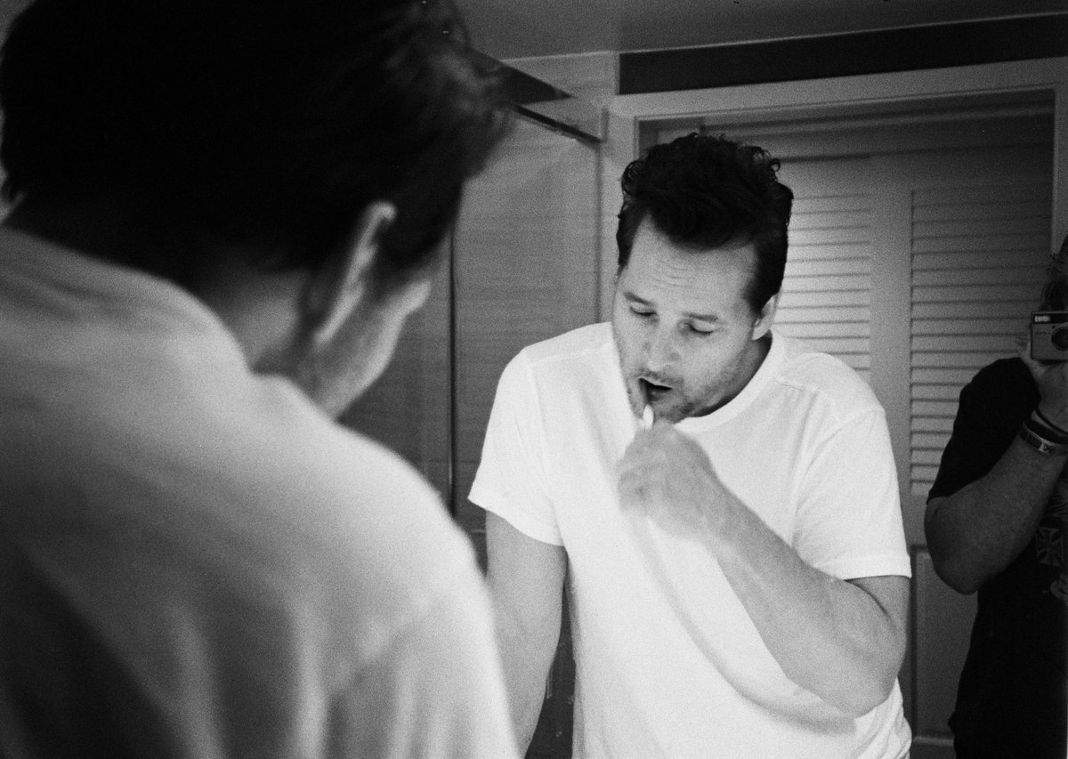 JoshuaShultz's tweet photo. For today’s Fine Art photos I present to you @peterfacinelli brushing his teeth 🦷 shot on Black and White film 🎞️ on @leica_camera #Minilux  on @kodak in Tampa #kodak #leica #twilight https://t.co/eHJ1j8ZqHf