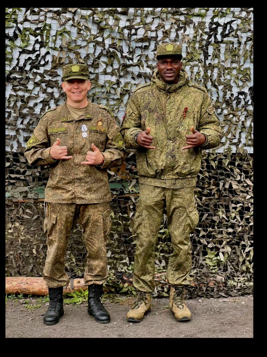 HonMpororo's tweet photo. Guys you see the interview of this Ugandan man from Wakiso district who work with Russia🇷🇺 special forces and he is on President Putin's team of security https://t.co/fNmfmG6dpu