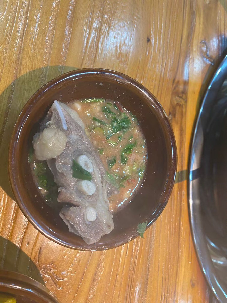 HunterHoeflich's tweet photo. It’s 11 PM, the neon sign glows warm, and miso soup simmers slow. Another quiet night, another story over bowls that steam like small, soft hugs. https://t.co/xTg1TctdqH