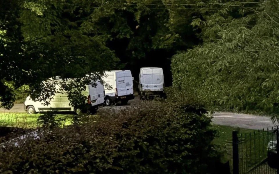 PolitlcsUK's tweet photo. 🚨 SUMMARY: What we know so far about the RAF Fairford suspected bomb plot 

- A farmer driving home in the early hours found three white vans blocking a village road with no one inside

- Suspicious, she immediately turned around before seeing a "group of Middle Eastern-looking young guys run off through the trees" in the direction of the air base wearing masks 

- One van displayed a UK number for a company called "Fuel 2You", which is not registered on Companies House. The number also appeared to be one digit short and does not ring when called

- She immediately called 999 and five men were arrested within 25 minutes under the Explosives Act. Homes were evacuated and a major incident was declared just after 8am

- Later today, the two rear doors of two of the vans were open and large black containers could be seen scattered around with a bomb disposal robot operating next to the vans

- The five suspects were then further arrested on suspicion of preparing a terrorist act 

- Counter Terror Police are understood to think that a suspected bomb plot linked to Iran is the most likely scenario due to US air bombers operating from the base

- Last night, before the incident, reports said that the base was at its highest alert with tractors blocking all gates. A local in the village said they had been stopped at gunpoint at a roadblock by a group of American soldiers, who ordered them to put their hands out of the car and identify themselves 

- Donald Trump claims the US had been investigating the five suspects and had them "under view for a long time"