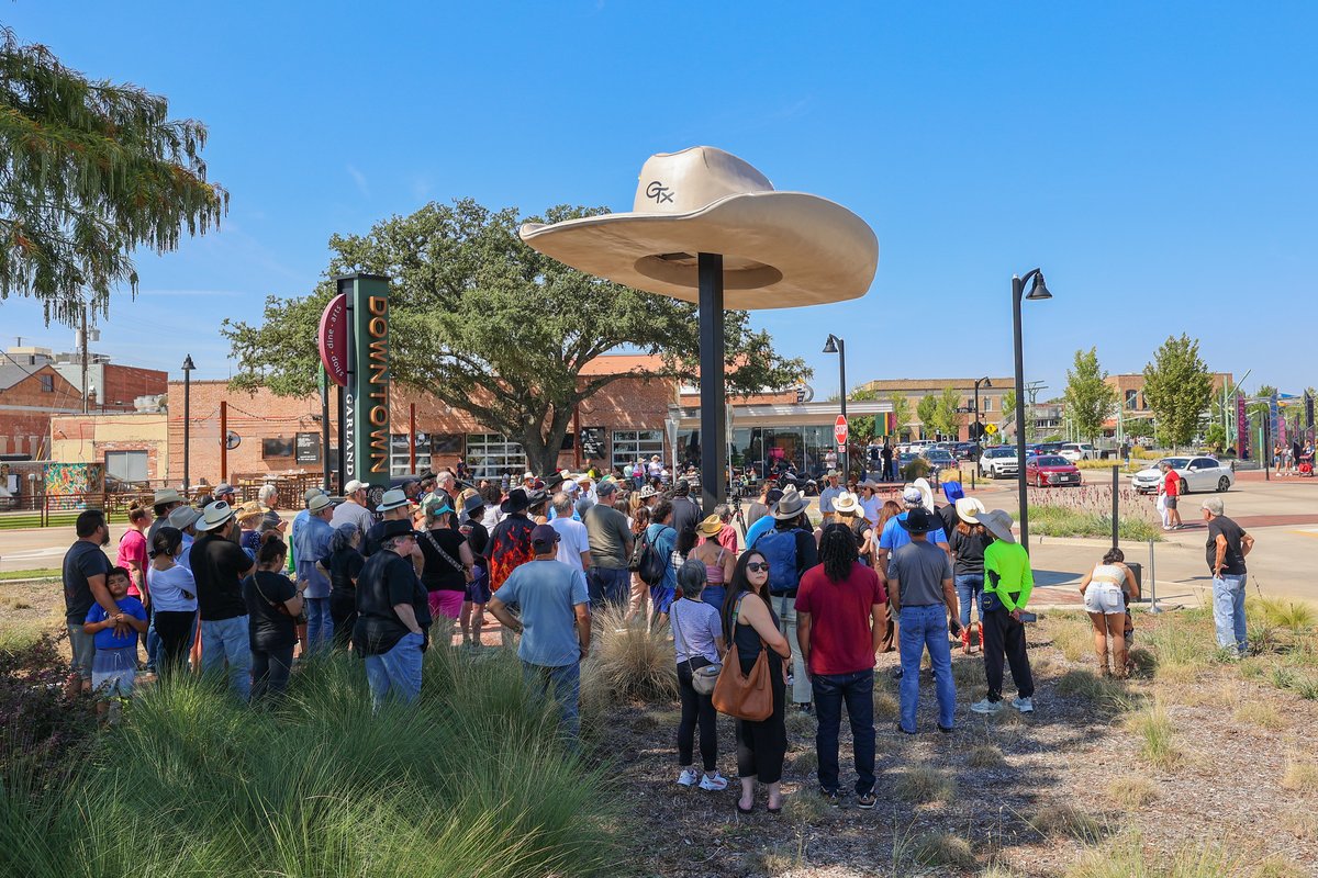 garlandtxgov's tweet photo. One year ago today, the City of Garland welcomed The Big Hat sculpture to Downtown Garland! 🤠 At 20 feet long, 16 feet wide, 6 feet tall and 15 feet in the air, it’s the largest cowboy hat in Texas.

See The Big Hat for yourself in Downtown Garland at 420 Main St. https://t.co/fMWTAL1PPX