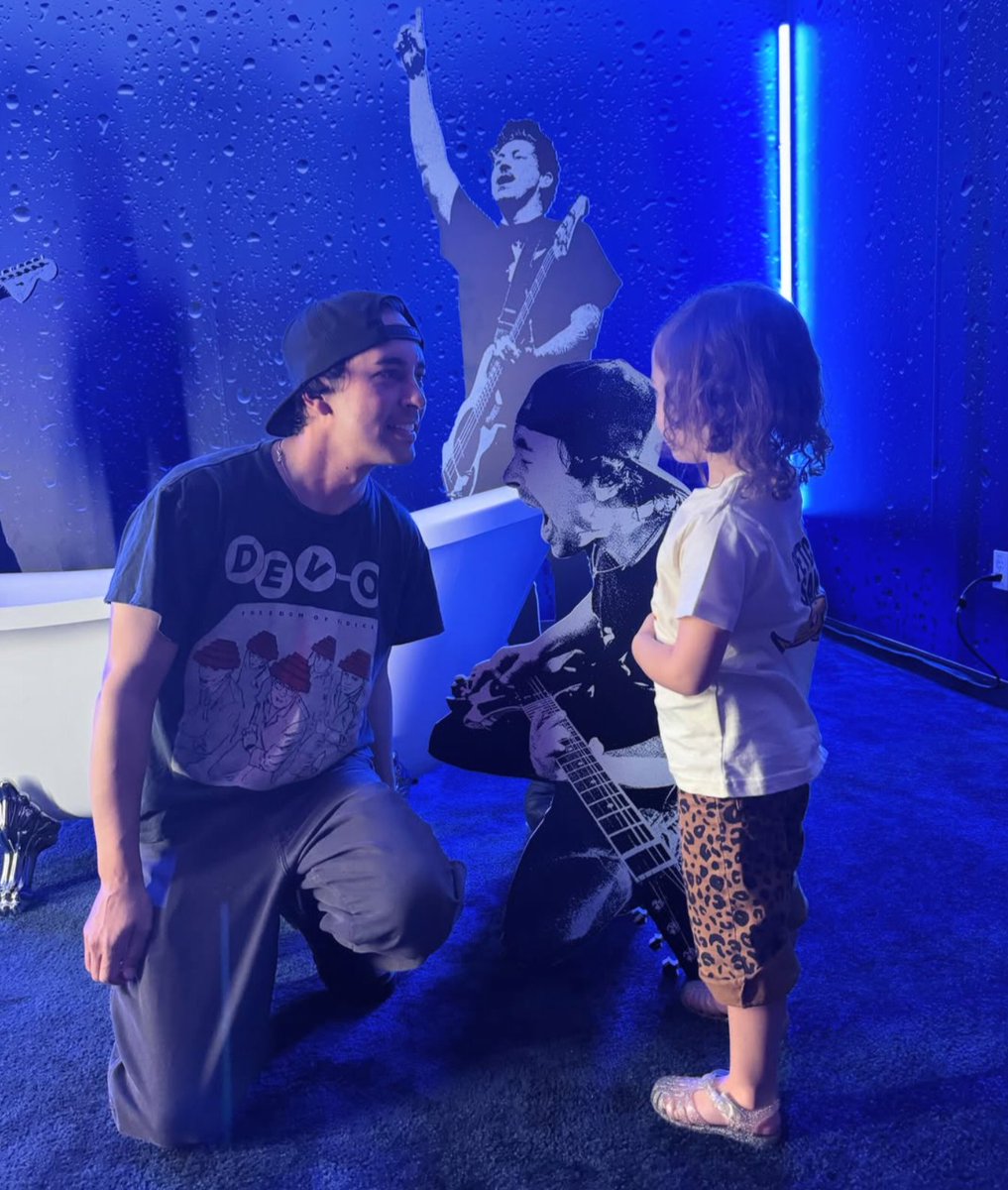SOTSPodcast's tweet photo. Vic Fuentes (Pierce The Veil) photographed by his wife Danielle backstage with his daughter. https://t.co/c2bwoWU2q7