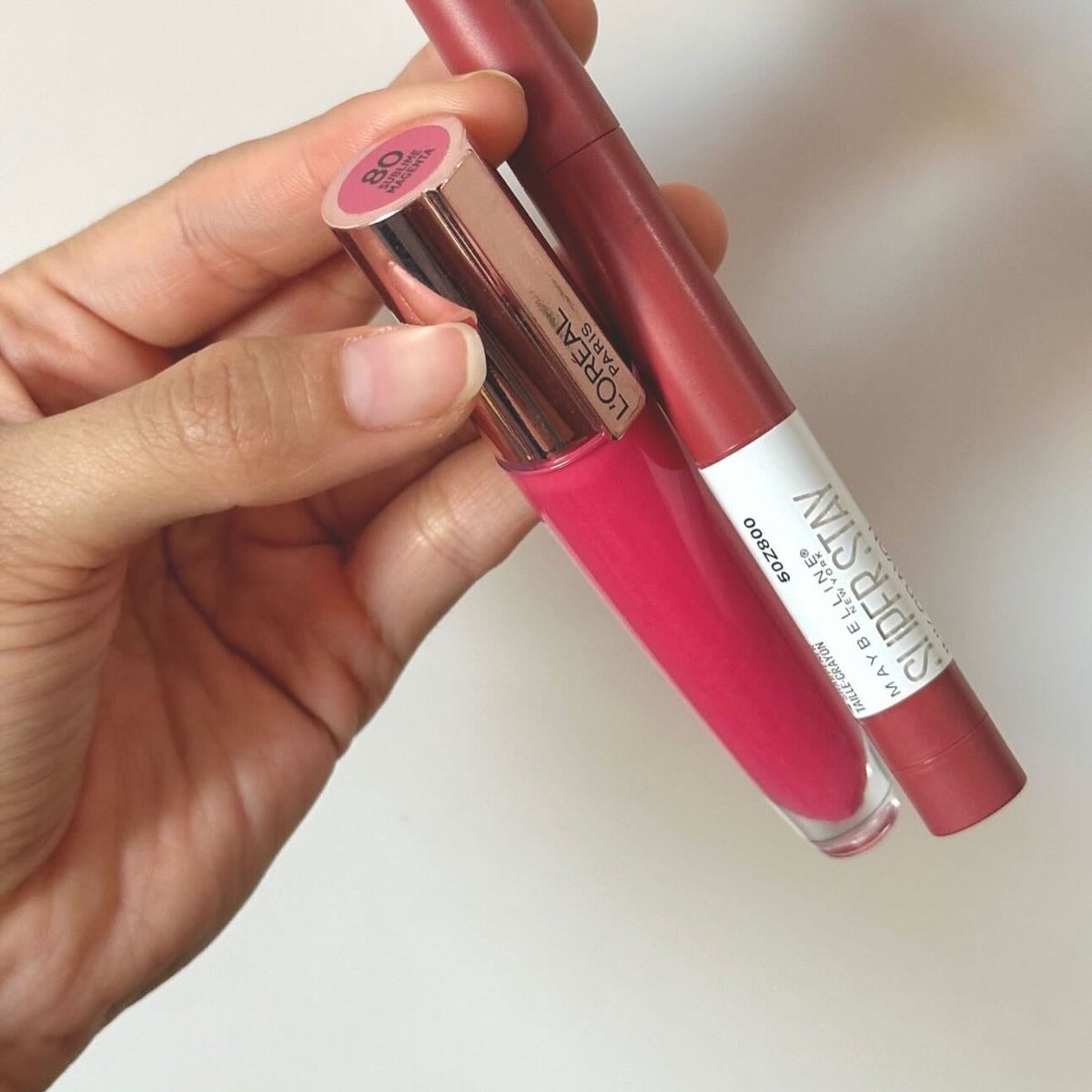 Edrius's tweet photo. TONO 80 SUBLIME MAGENTA, $195. L’Oréal Paris Glow Paradise Hydrating Lip Balm-in-Gloss with Pomegranate Extract and Hyaluronic Acid. https://t.co/T7Q9QVnDuU