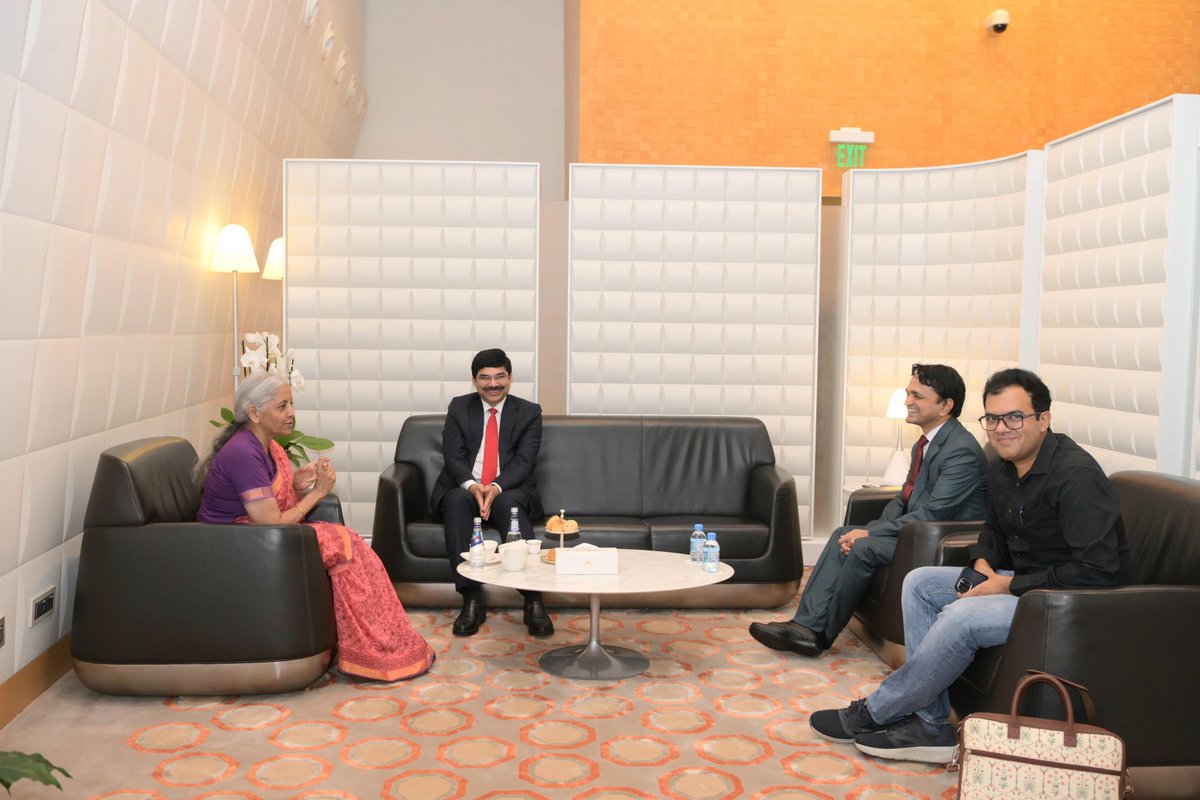 IndEmbDoha's tweet photo. Hon’ble Union Minister for Finance & Corporate Affairs, Smt. Nirmala Sitharaman, was welcomed and received by the Ambassador of India to Qatar, @srikar_koppula, upon her arrival at Hamad International Airport in Doha today. 

The Hon’ble Union Minister for Finance & Corporate Affairs is scheduled to participate in the 11th Annual Meeting of the Asian Infrastructure Investment Bank (AIIB) and the AIIB Investors Dialogue 2026 in Doha over the next two days.

#AIIB2026 #IndiaAtAIIB 

@nsitharaman @nsitharamanoffc
@FinMinIndia @MEAIndia @DrSJaishankar
@IndianDiplomacy @diaspora_india
@PIB_India @DDNewslive @mygovindia