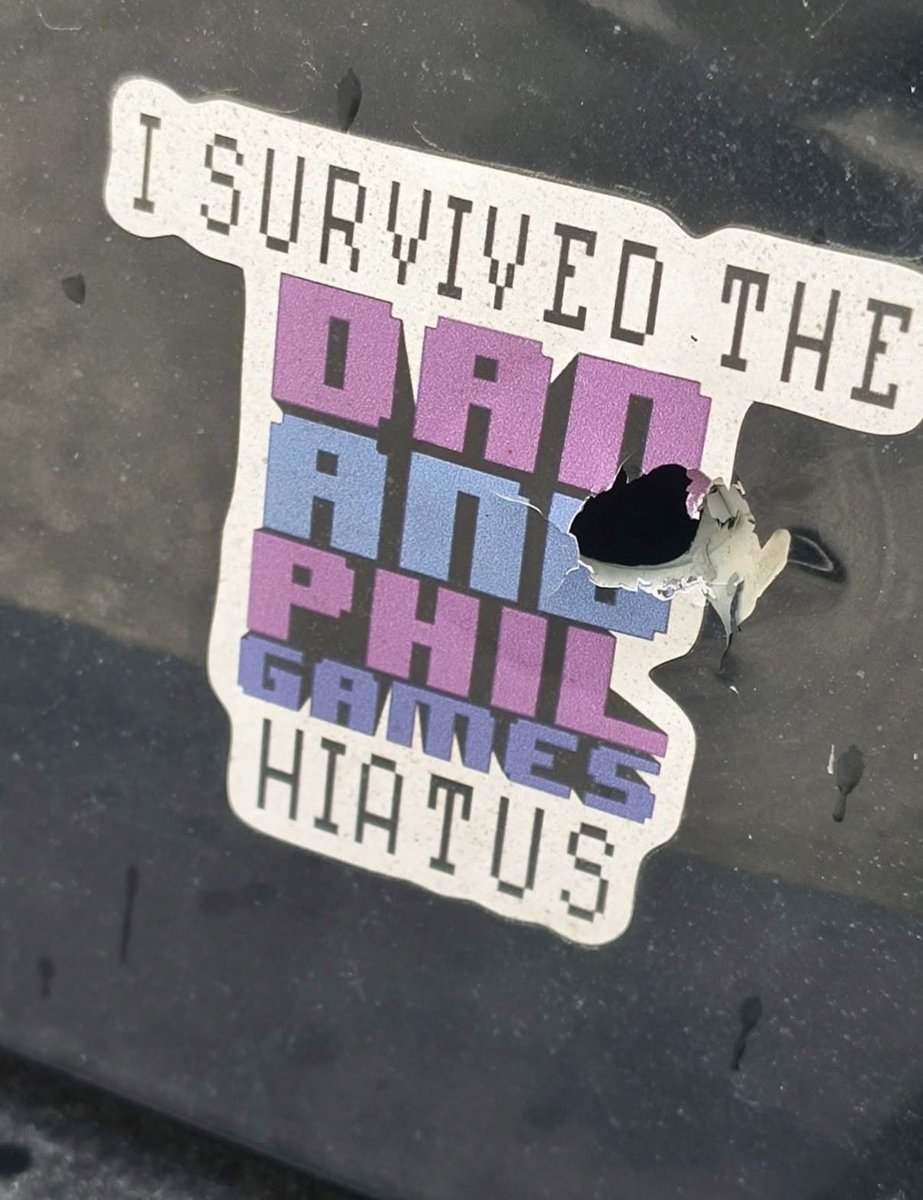 whocoaxedyou's tweet photo. @danielhowell My neighbor’s car was shot through the Dan and Phil games sticker https://t.co/RFwrBdKCsN