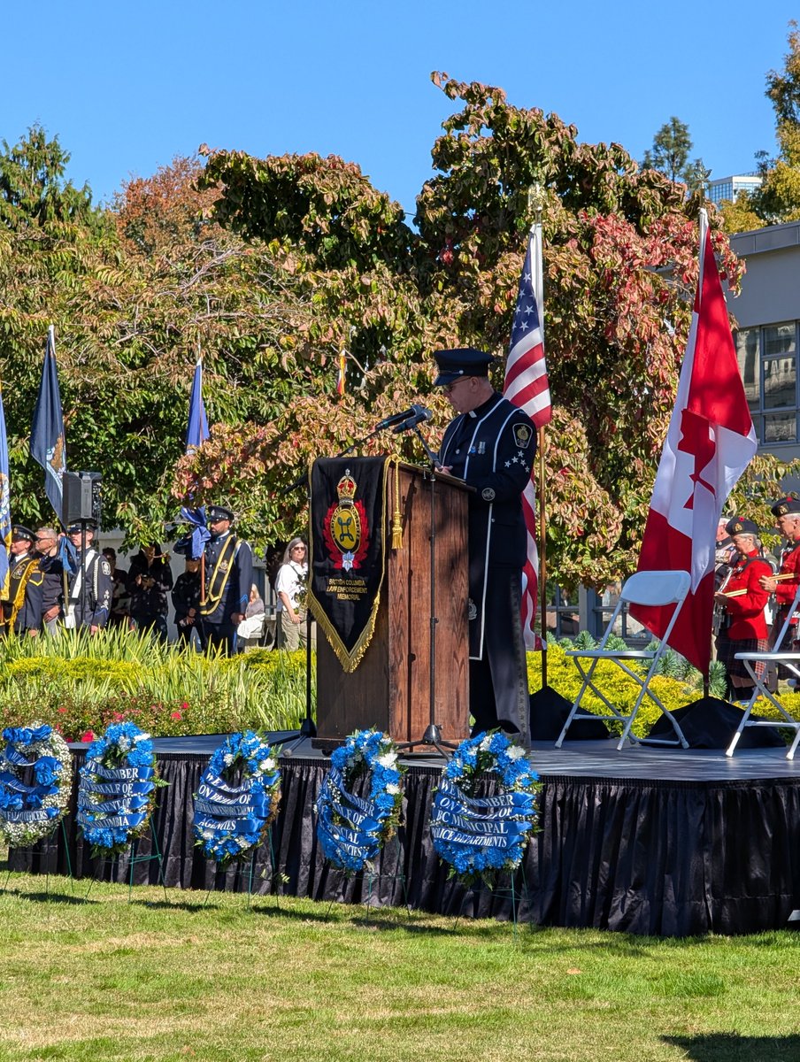 BCLEMemorial's tweet photo. Chaplain Marty CAYER welcomed all those in attendance, to the 29th British Columbia Law Enforcement Memorial here in the #GardenOfHonour at the BC Legislature. He noted similar services are taking place across #Canada.

#HonourThe135 #NeverForget #BCLEM
#AHeroRememberedNeverDies https://t.co/XsVKtTWhfJ