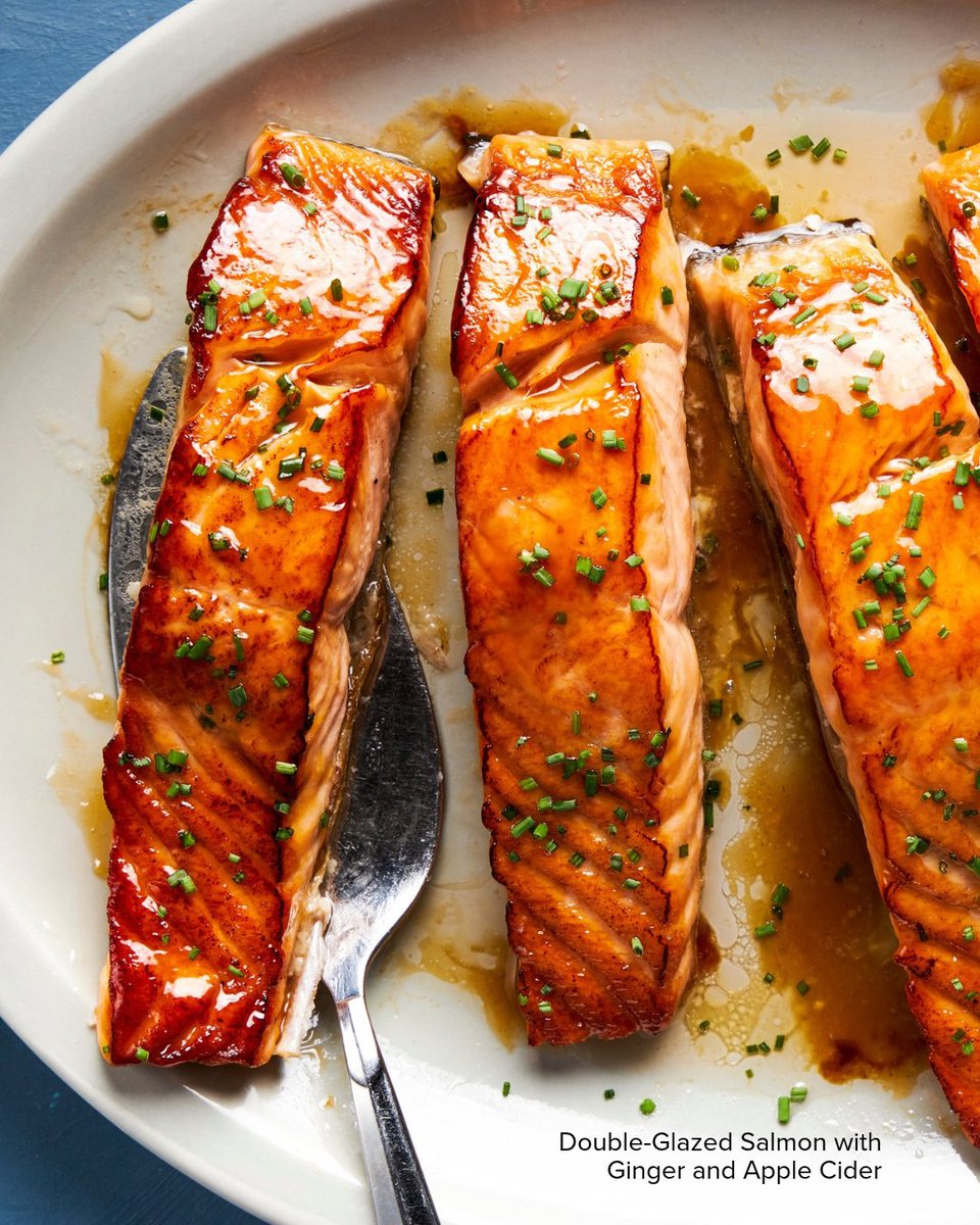 TestKitchen's tweet photo. This Double-Glazed Salmon with Ginger and Apple Cider brines center-cut fillets for moisture, then coats them twice in a glossy glaze of apple cider, ginger, and soy sauce for a beautifully browned, deeply flavored finish. https://t.co/BdxaYpskHn https://t.co/jSDLf9SMO9