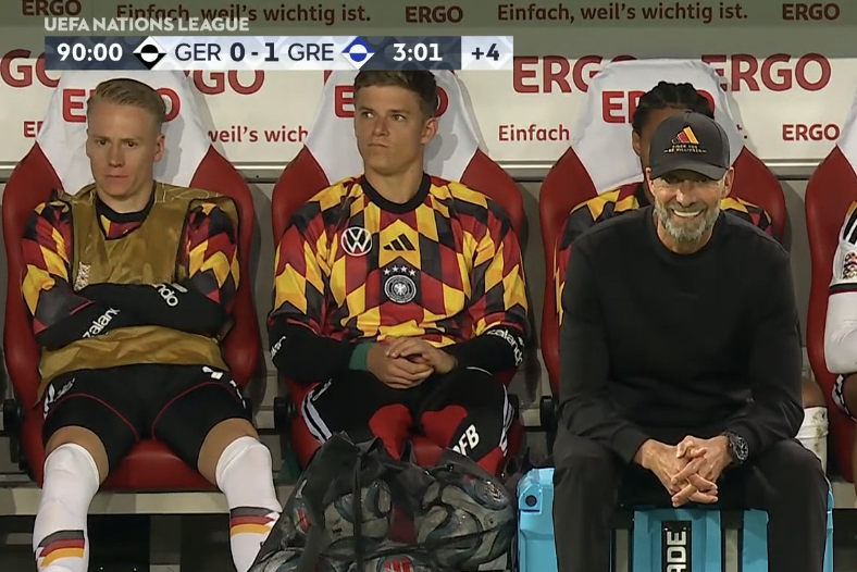 TouchlineX's tweet photo. 📸 - Jürgen Klopp is smiling but the Germans won't be smiling after this performance.

Germany have improved NOTHING AT ALL and will LOSE AT HOME vs GREECE! https://t.co/lPtbDYVeXE