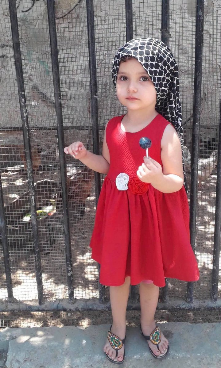 YamenNashwan11's tweet photo. All this beauty had an even more beautiful name: Esraa Al-Hessi.

Before she could even turn five, an Israeli army sniper decided that she would be a target today. A single bullet struck her in the head while she was inside her tent east of Deir al-Balah.

What could a little girl who had not yet turned five have possibly done to become the target of a rifle?

She had barely begun to discover the world, but one bullet was enough to make this beautiful little girl sleep forever. She did not even know what death was.