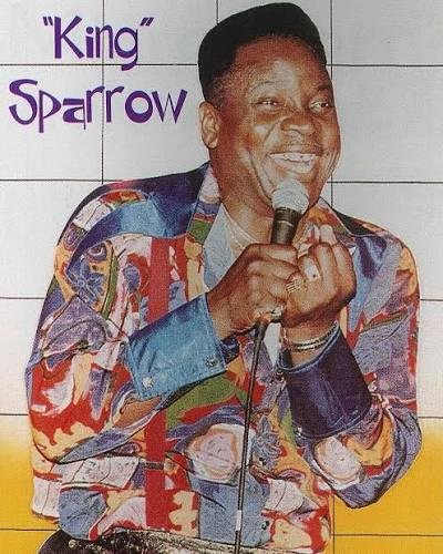 PM_Kamla's tweet photo. GOODBYE TO THE GREATEST
Today, our nation mourns the loss of an icon whose legacy will forever live in the hearts of all citizens of Trinidad and Tobago.

Sparrow was a true patriot and revered ambassador of Trinidad and Tobago’s culture. Through his music, his wit and his unmatched contribution to culture, he carried the spirit and stories of our people across the world.

For decades, Sparrow has been part of the soundtrack of Trinidad and Tobago. His music made us laugh, made us think and made us proud of who we are.

On behalf of the Government and people of Trinidad and Tobago, I extend my deepest condolences to his family and loved ones. 

Rest in peace, Mighty Sparrow. Your voice will live on forever. 🇹🇹🕊️