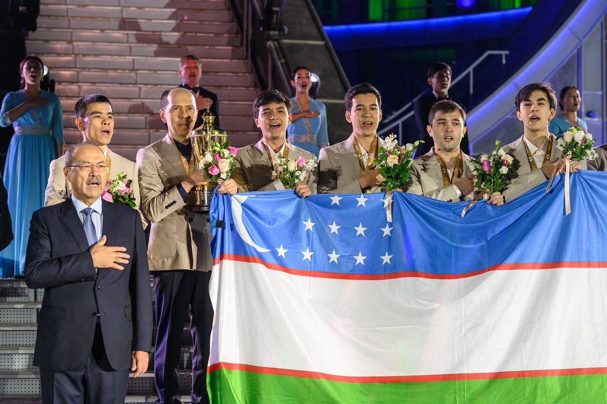 ChessbaseIndia's tweet photo. The Champions of FIDE Chess Olympiad 2026 - Team Uzbekistan singing the National Anthem at the closing ceremony in Samarkand!

Photo: FIDE/ Michal Walusza https://t.co/i3cBuCU7cE