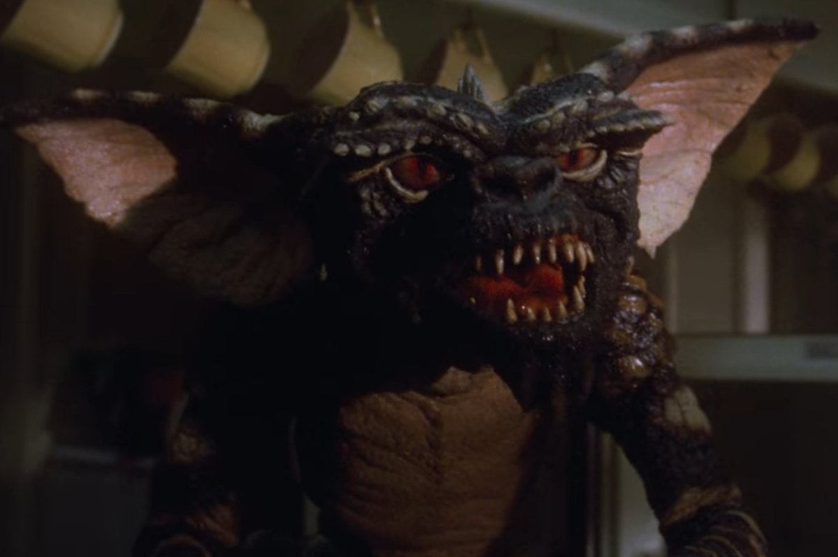 THE_Gremlins__'s tweet photo. "...Kiiiillll!"

The Gremlin jumped off the counter and ran after her, snarling and cackling as it did. https://t.co/Rh7k35m91n