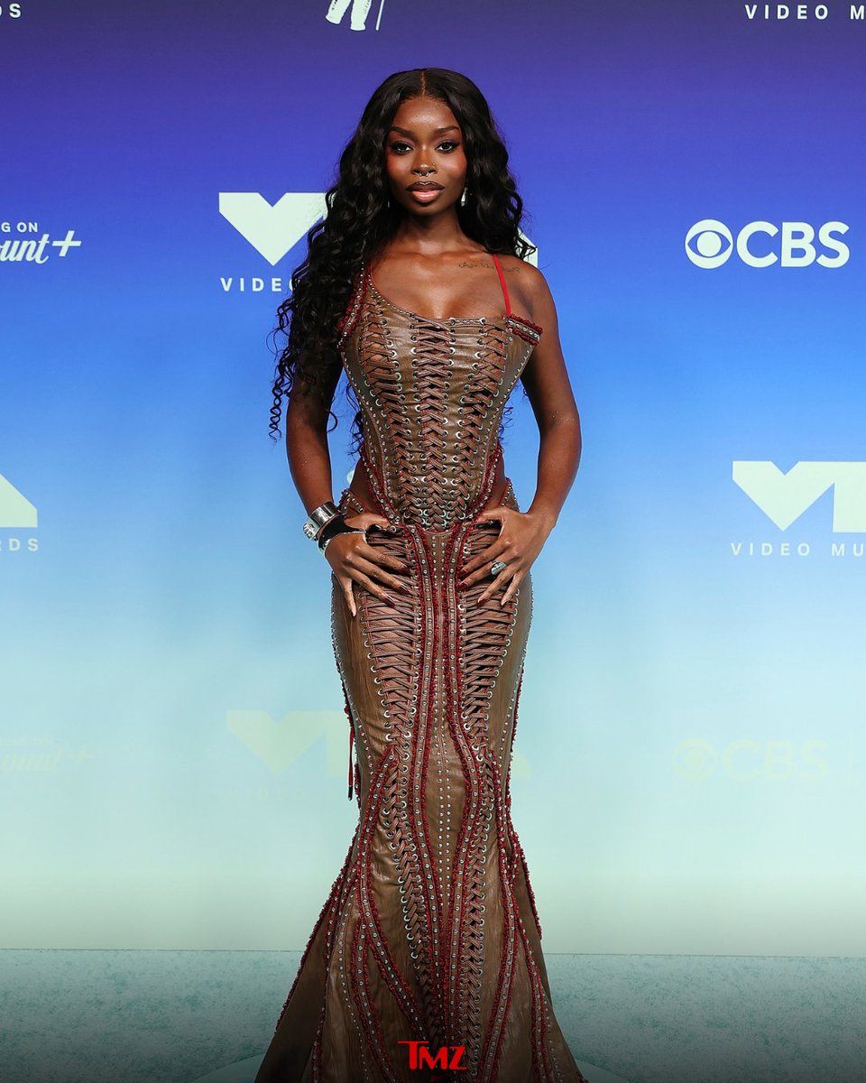 TMZ's tweet photo. Olandria stuns on the carpet at the 2026 MTV VMAs 🤎✨ https://t.co/joQgPC6u47

📸 Getty https://t.co/CTo2Lw5BEz