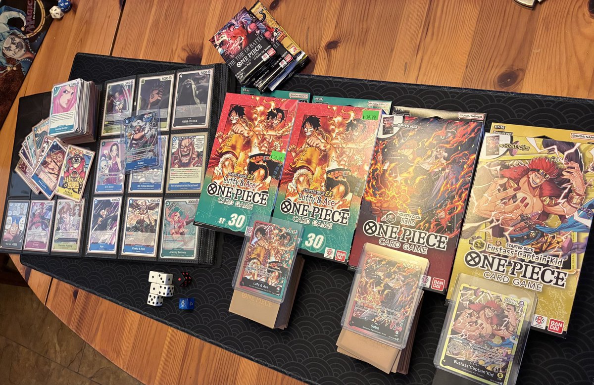 JPingOrochi's tweet photo. My lil OP Collection so far. Blue Buggy St on the way. #onepiecetcg #optcg https://t.co/kPdeaIaShu