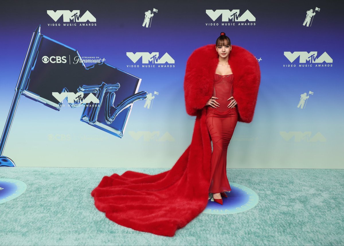 Spotify's tweet photo. LISA just turned the #VMAs carpet into a “SaWaDiKa” moment ❤️‍🔥

📷: Getty https://t.co/ZRqz3NThXj