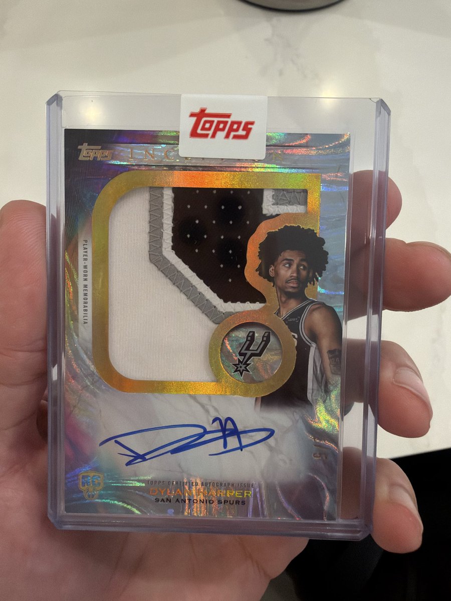 VinnDad's tweet photo. A $15K+ Dylan Harper RPA /5 redemption arrived from @Topps in a paper kraft mailer with only thin bubble wrap—damaged corners, edges and delamination. I’ve had far cheaper redemptions shipped in boxes. Please make this right and improve the shipping standard for redemptions. Customers deserve better. @michaelrubin @CardPurchaser #basketballcards