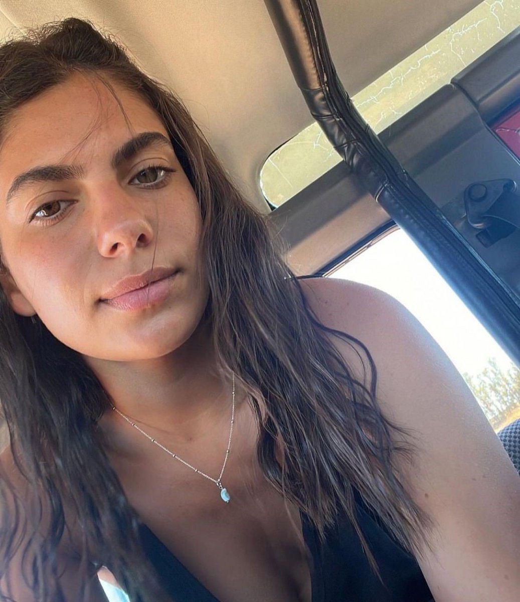 RabbiPoupko's tweet photo. After 3 years in a temporary grave,  Ofir Shoshani who was murdered by the men of Gaza on October 7th, has been brought to rest in her native Kfar Azza.

Ofir was in her home in the Young Neighborhood of Kibbutz Kfar Azza on the morning of October 7th.

When the attack began, Ofir locked herself inside the safe room.

Around 10:00 AM that morning, Ofir wrote on WhatsApp to her family that she had been shot, that her hand was wounded, and that she needed help.

Her friends desperately tried to get emergency responders to her. Her father, refusing to leave his daughter alone and wounded, took a weapon and went out of his home in an attempt to reach her but he was shot and wounded by Hamas terr0rists.

At 11:46 a.m., Ofir sent her friends one final message:

"I love you."

And to her mother:

"I love you."

Those were her last words.

 The men of Gaza sh0t at point blank a 20 year old woman who had already been wounded by bu!!ets.

We will never forget 💔