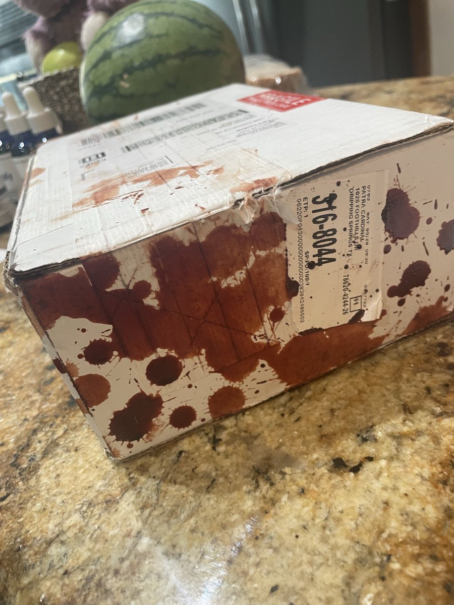 patracardinal's tweet photo. Got bloody splattered box from @fedex. The delivery guy had a neck gaiter, dark glasses, hat, long sleeves and gloves.  All very suspicious. https://t.co/V4c57o3qXX