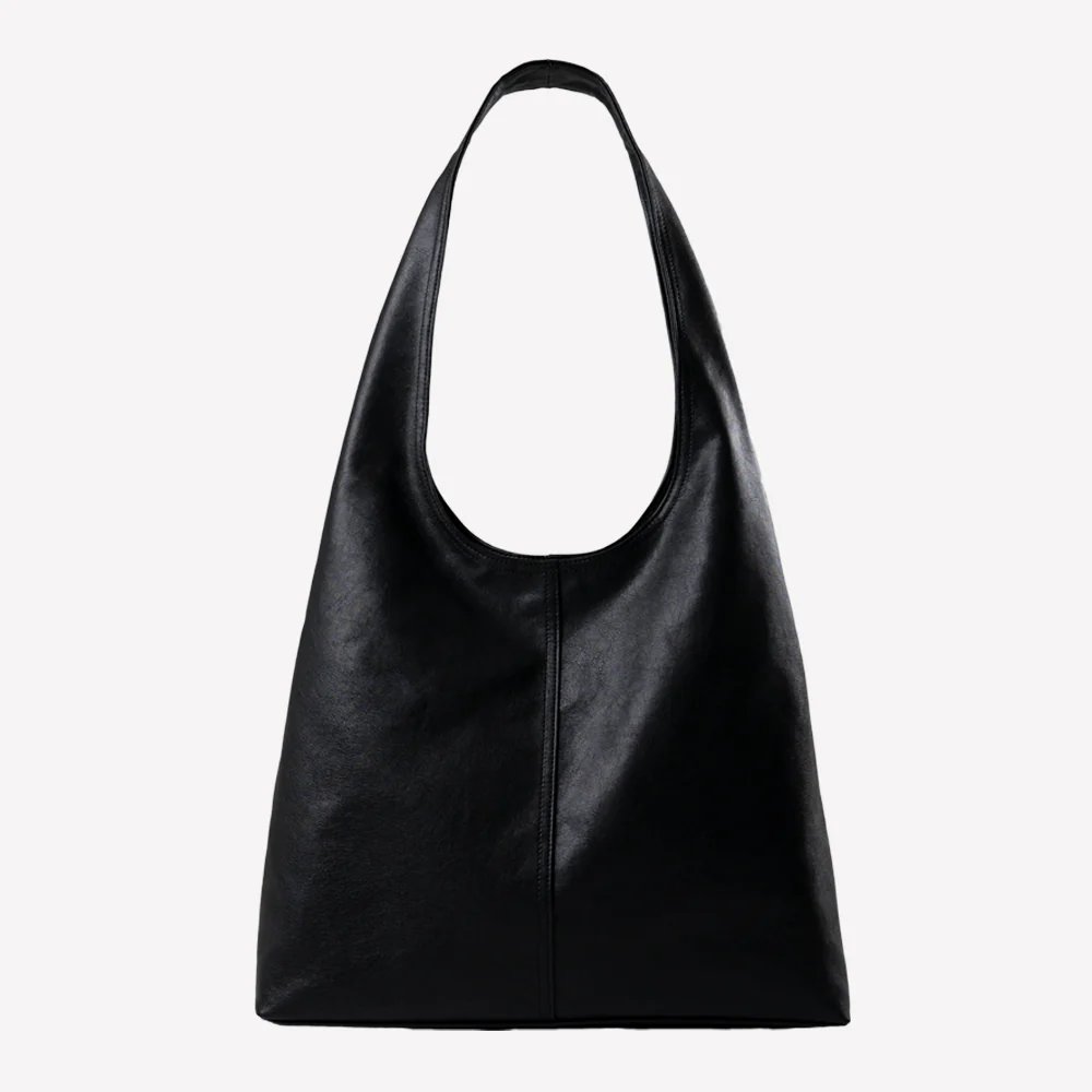 heraccessrylane's tweet photo. The One You Reach For: Most people own 3-5 "everyday" bags but reach for the same one 80% of the time. The right bag isn't about having more — it's about having the one that works. 🖤 #heraccessorylane https://t.co/r2COmoNRgC